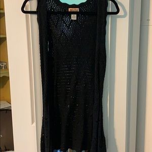 Black sleeveless knit sweater